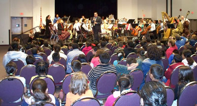 Maestro Salazar talks to the children